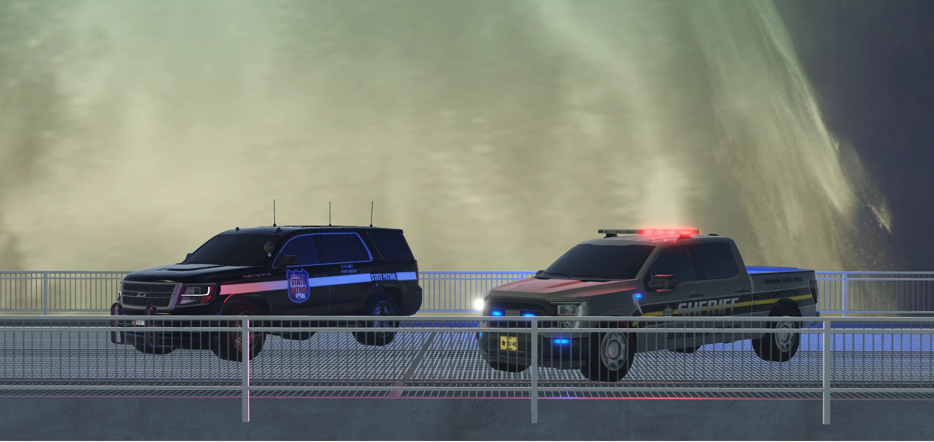 A Wisconsin State Patrol SUV and a Sheriff pickup with lights on, parked on a bridge.